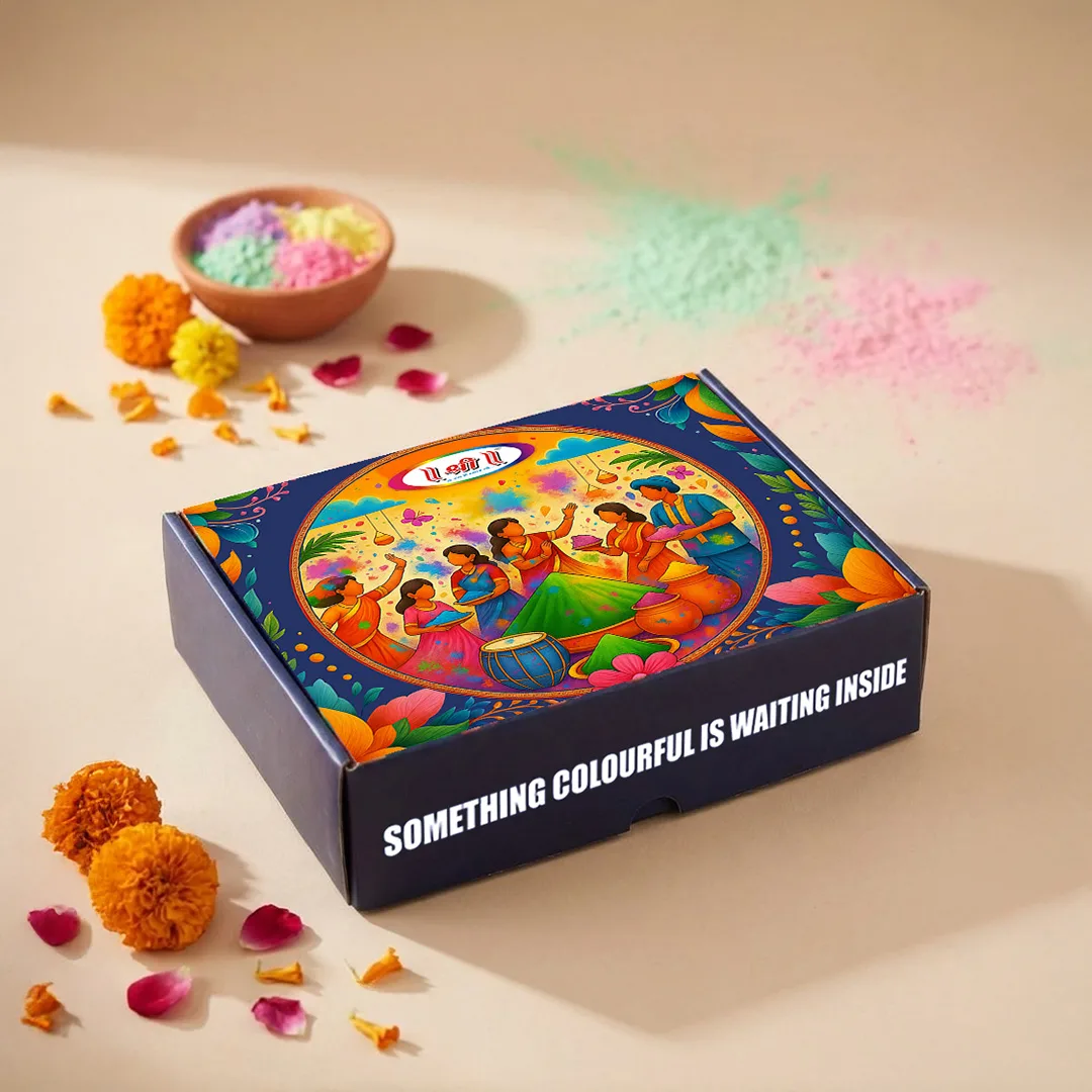 Shri Flower Fusion Herbal Gulal Gift Set — closed gift box with marigolds